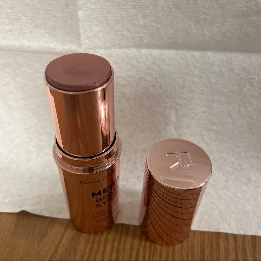 Makeup RevolutionGlow Mega Beam Stick Rose Gold.  
Each net weight is 0.63 oz